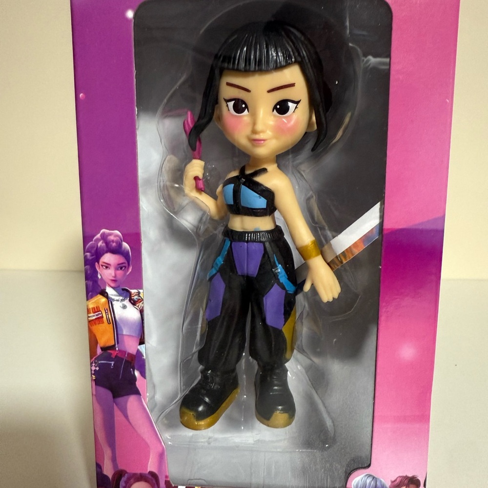 Stylish Action Doll with Purple and Black Outfit